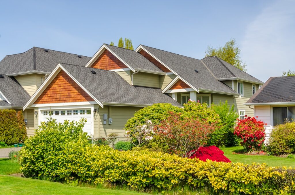Houses in suburb at Summer in the north America. Luxury houses with nice landscape.