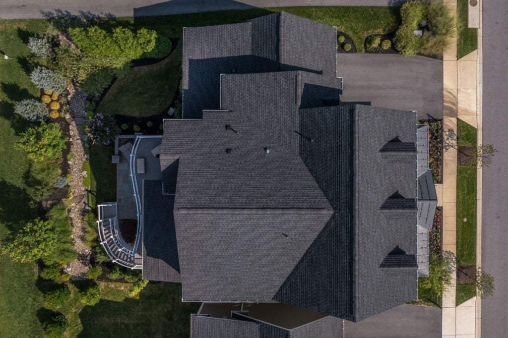 big grey hip roof vs gable roof cenital garden