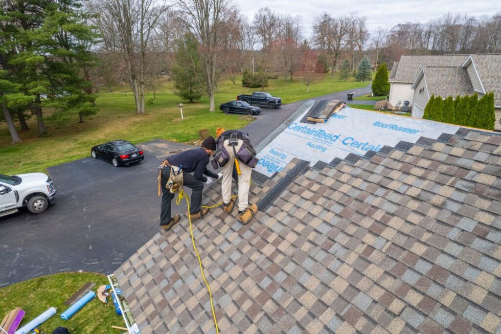 architectural shingles vs 3 tab Keim Quality Roofing workers replacing shingles roof