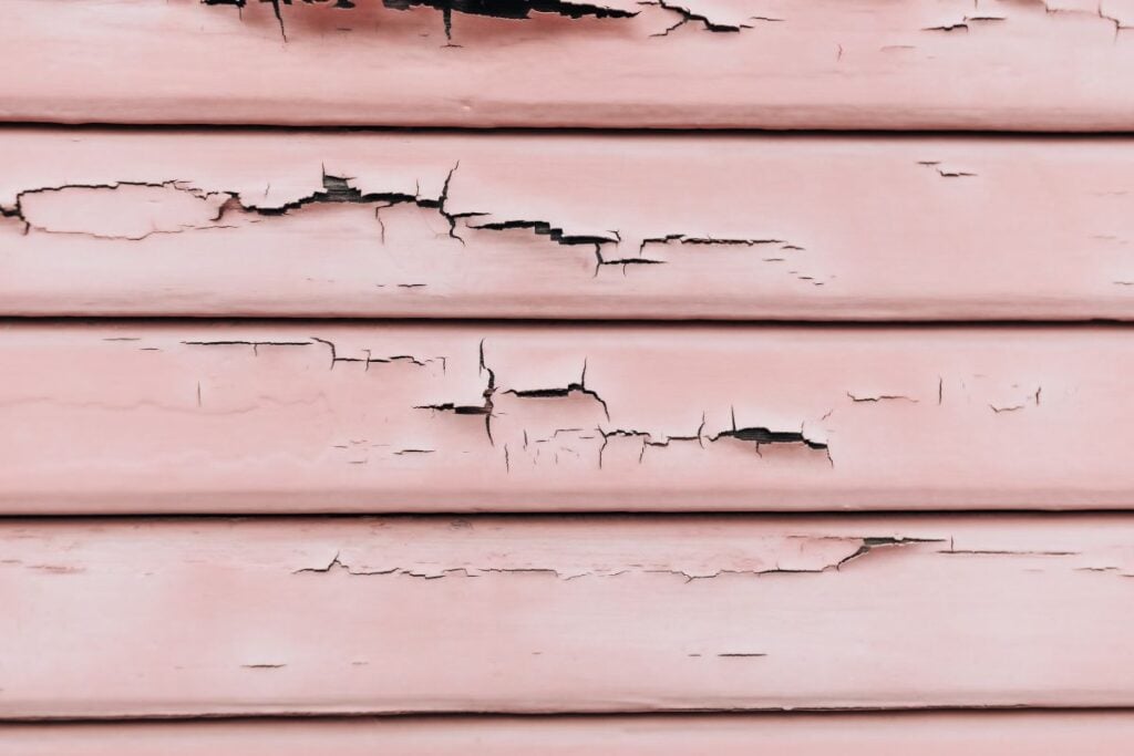 what does hail damage look like on siding pink paint cracking up