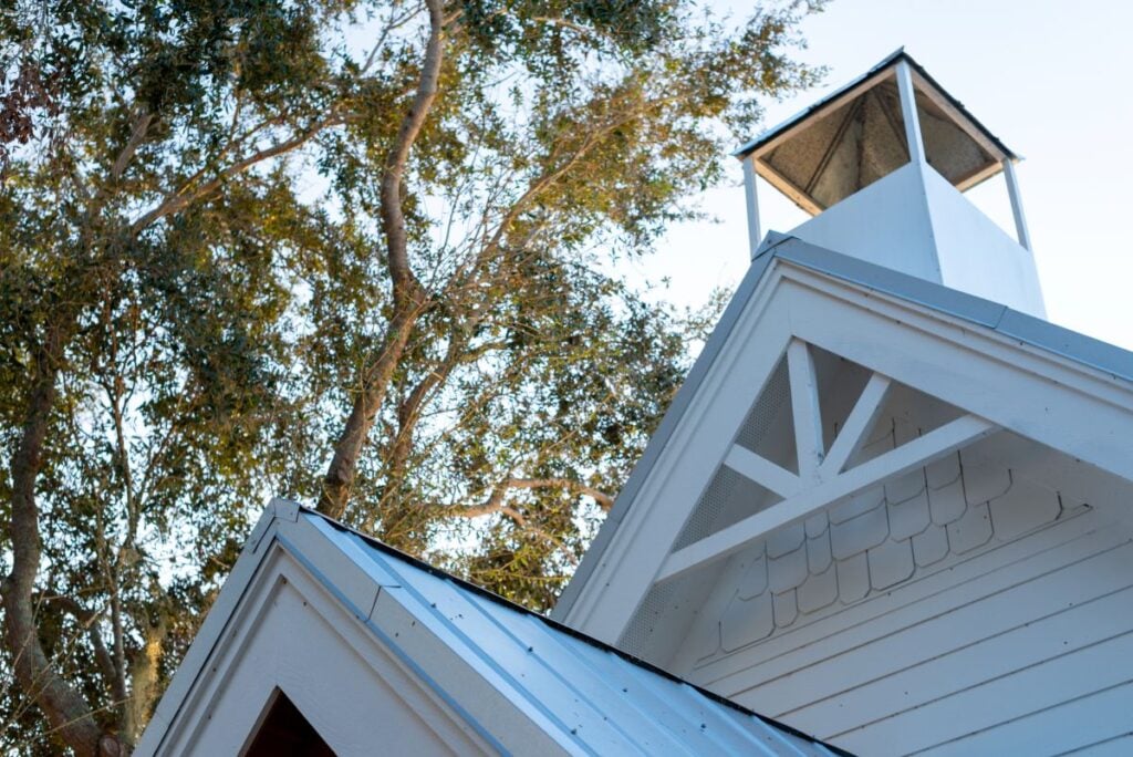 metal roof accents white cupola and grey metallic sheet